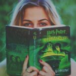 Story - Woman Reading Harry Potter Book